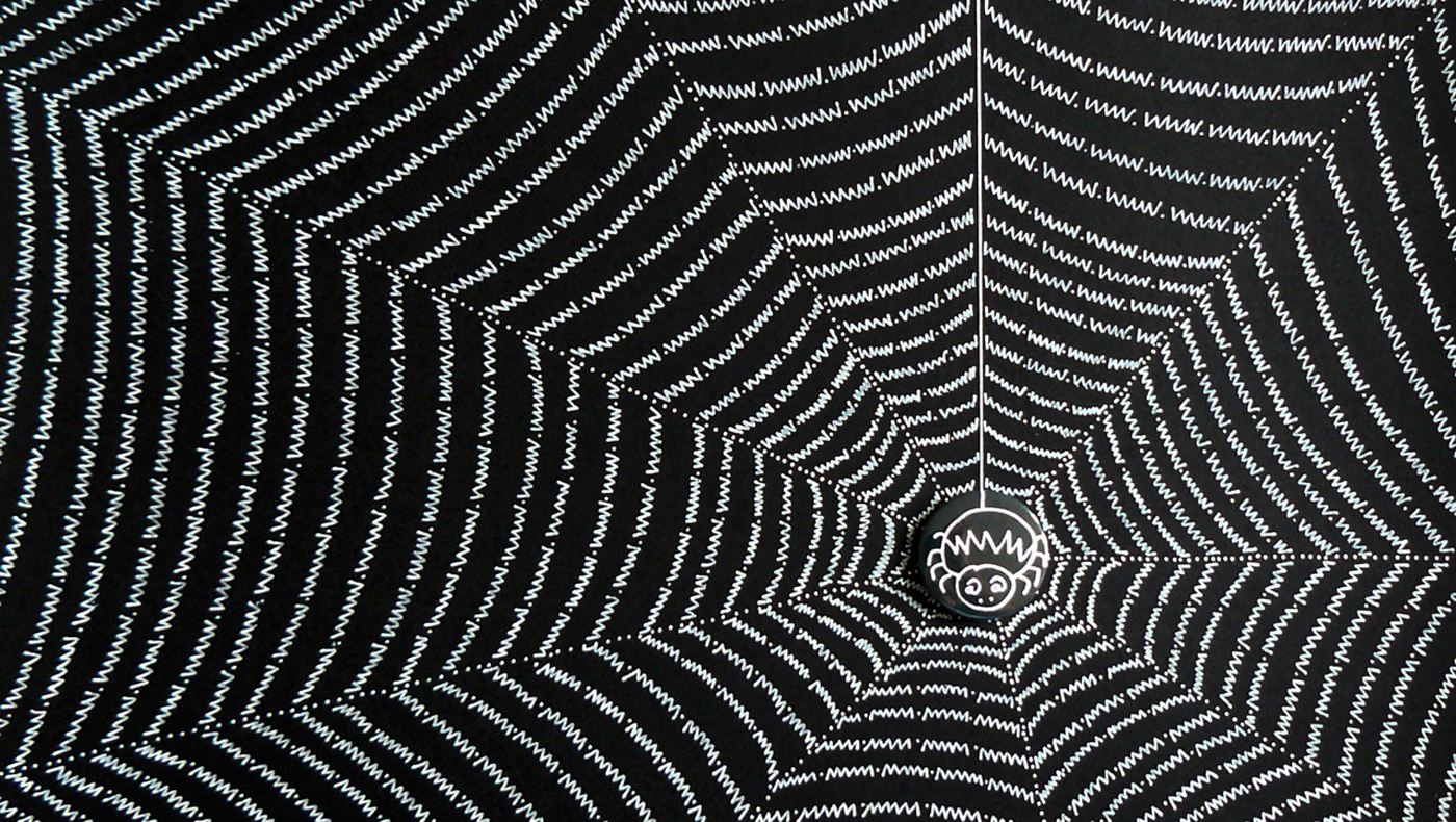 illustrative artwork - a web made from the letters www with a drawing of a spider on a badge