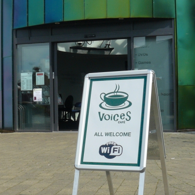 Voices Cafe logo in use on a display board